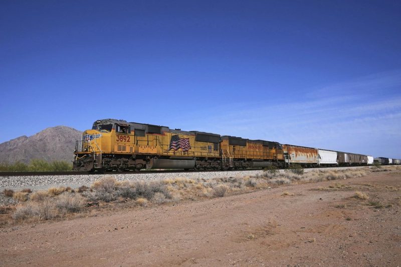 July 29 (Reuters) – Union Pacific said on Tuesday it would buy smaller rival Norfolk Southern in an $85-billion deal to create the country’s first coast-to-coast freight rail operator and reshape the movement of goods from grains to autos across the U.S.
If approved, the deal would be the largest-ever buyout in the sector and combine Union Pacific‘s stronghold in the western two-thirds of the United States with Norfolk’s 19,500-mile network that primarily spans 22 eastern states.
The two railroads are expected to have a combined enterprise value of $250 billion and would unlock about $2.75 billion in annualized synergies, the companies said.
The $320 per share price implies a premium of 18.6% for Norfolk from its close on July 17, when reports of the merger first emerged.
The companies said on Thursday they were in advanced discussions for a possible merger.
The deal will face lengthy regulatory scrutiny amid union concerns over potential rate increases, service disruptions and job losses. The 1996 merger of Union Pacific and Southern Pacific had temporarily led to severe congestion and delays across the Southwest.
The deal reflects a shift in antitrust enforcement under U.S. President Donald Trump’s administration. Executive orders aimed at removing barriers to consolidation have opened the door to mergers that were previously considered unlikely.
A Norfolk Southern freight train passes through Homestead, Pa.Gene J. Puskar / AP file
Surface Transportation Board Chairman Patrick Fuchs, appointed in January, has advocated for faster preliminary reviews and a more flexible approach to merger conditions.
Even under an expedited process, the review could take from 19 to 22 months, according to a person involved in the discussions.
Major railroad unions have long opposed consolidation, arguing that such mergers threaten jobs and risk disrupting rail service.
“We will weigh in with the STB (regulator) and with the Trump administration in every way possible,” said Jeremy Ferguson, president of the SMART-TD union‘s transport division, after the two companies said they were in advanced talks last week.
“This merger is not good for labor, the rail shipper/customer or the public at large,” he said.
The companies said they expect to file their application with the STB within six months.
The SMART-TD union‘s transport division is North America’s largest railroad operating union with more than 1,800 railroad yardmasters.
The North American rail industry has been grappling with volatile freight volumes, rising labor and fuel costs and growing pressure from shippers over service reliability, factors that could further complicate the merger.
Union Pacific‘s shares were down about 1.3%, while Norfolk fell about 3%.
The proposed deal had also prompted competitors BNSF, owned by Berkshire Hathaway BRKa.N, and CSX CSX.O, to explore merger options, people familiar with the matter said.
Agents at the STB are already conducting preparatory work, anticipating they could soon receive not just one, but two megamerger proposals, a person close to the discussions told Reuters on Thursday.
If both mergers are approved, the number of Class I railroads in North America would shrink to four from six, consolidating major freight routes and boosting pricing power for the industry.
The last major deal in the industry was the $31-billion merger of Canadian Pacific CP.TO and Kansas City Southern that created the first and only single-line rail network connecting Canada, the U.S. and Mexico.
That deal, finalized in 2023, faced heavy regulatory resistance over fears it would curb competition, cut jobs and disrupt service, but was ultimately approved.
Union Pacific is valued at nearly $136 billion, while Norfolk Southern has a market capitalization of about $65 billion, according to data from LSEG.
<em>(Reuters reporting by Shivansh Tiwary and Sabrina Valle, additional reporting by Abhinav Parmar, Nathan Gomes and Mariam Sunny; Reuters editing by Sriraj Kalluvila, Pooja Desai, Dawn Kopecki and Cynthia Osterma)</em>
This post appeared first on NBC NEWS